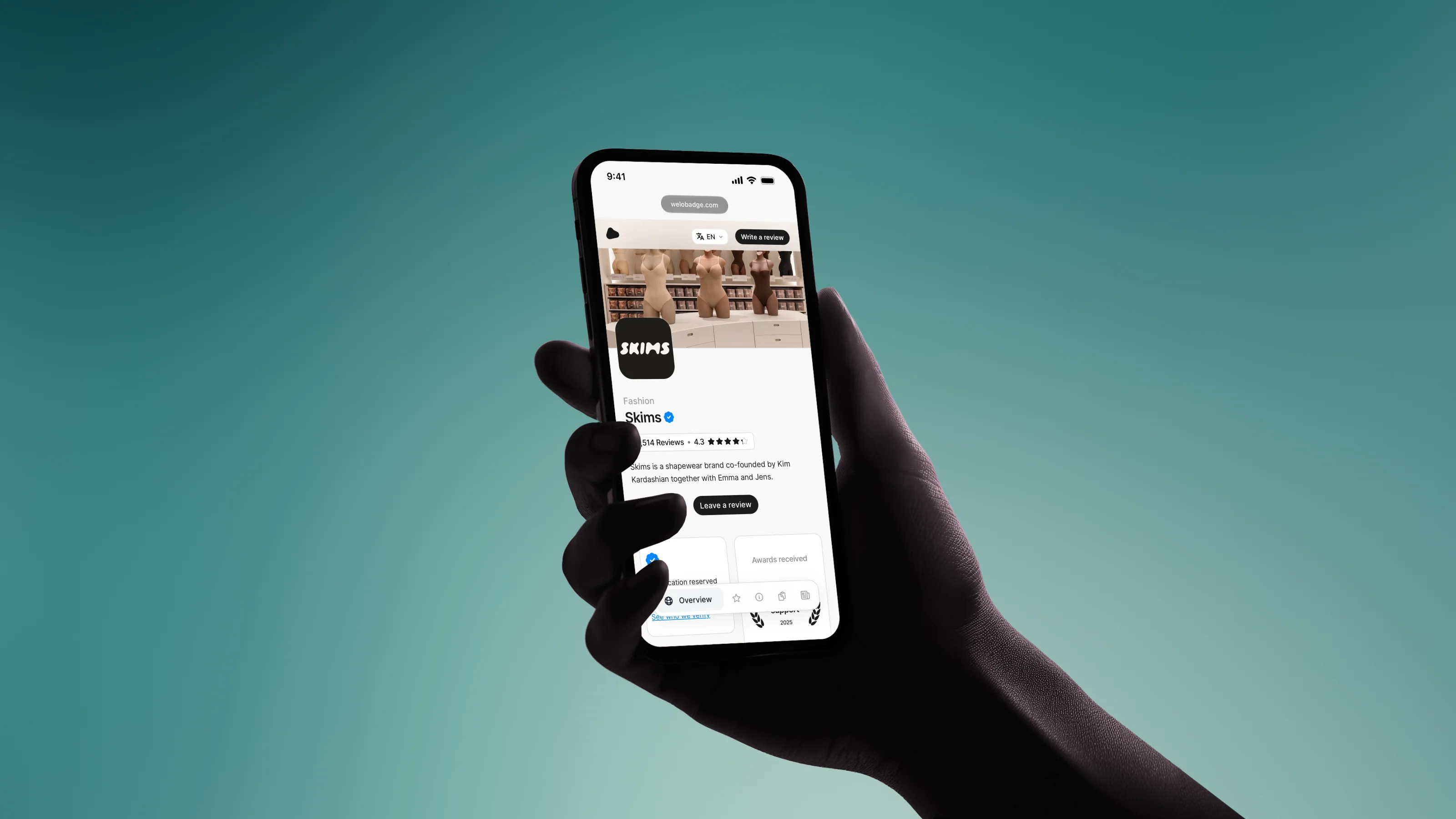 A hand holding a phone with a Welo Page open